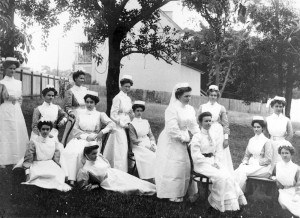 Lady Bowen Hospital, Wickham Terrace, Brisbane, Graduation Class of 1907. Doctor Eleanor Greenham can be seen sitting in on a chair in front of Matron Capner at the front of the photo in plain dress - Image courtesy of Picture Ipswich
